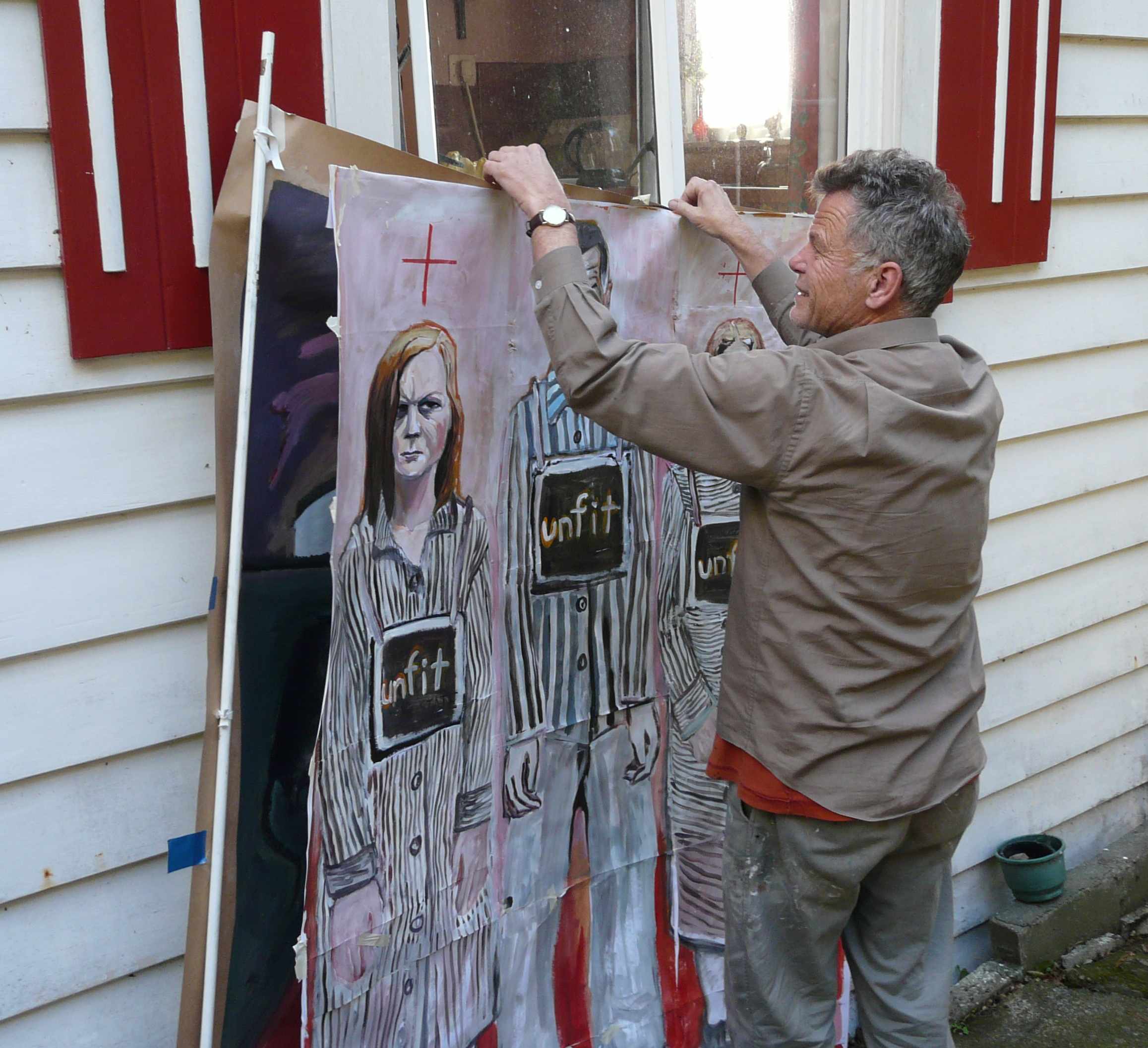 Gerard holding painting