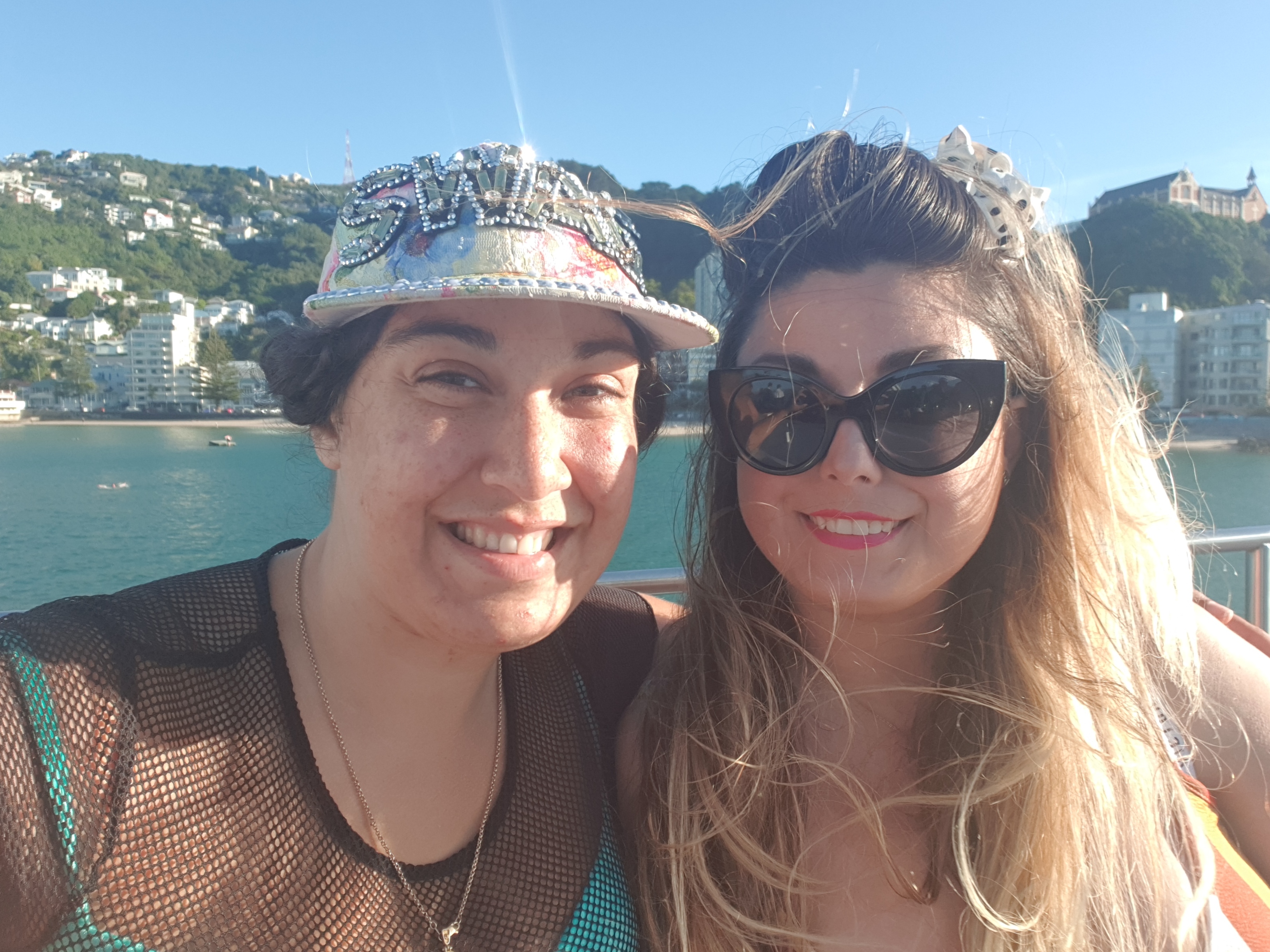 Marika and Heleyni as adults. Smiling in the sunshine of Oriental Bay