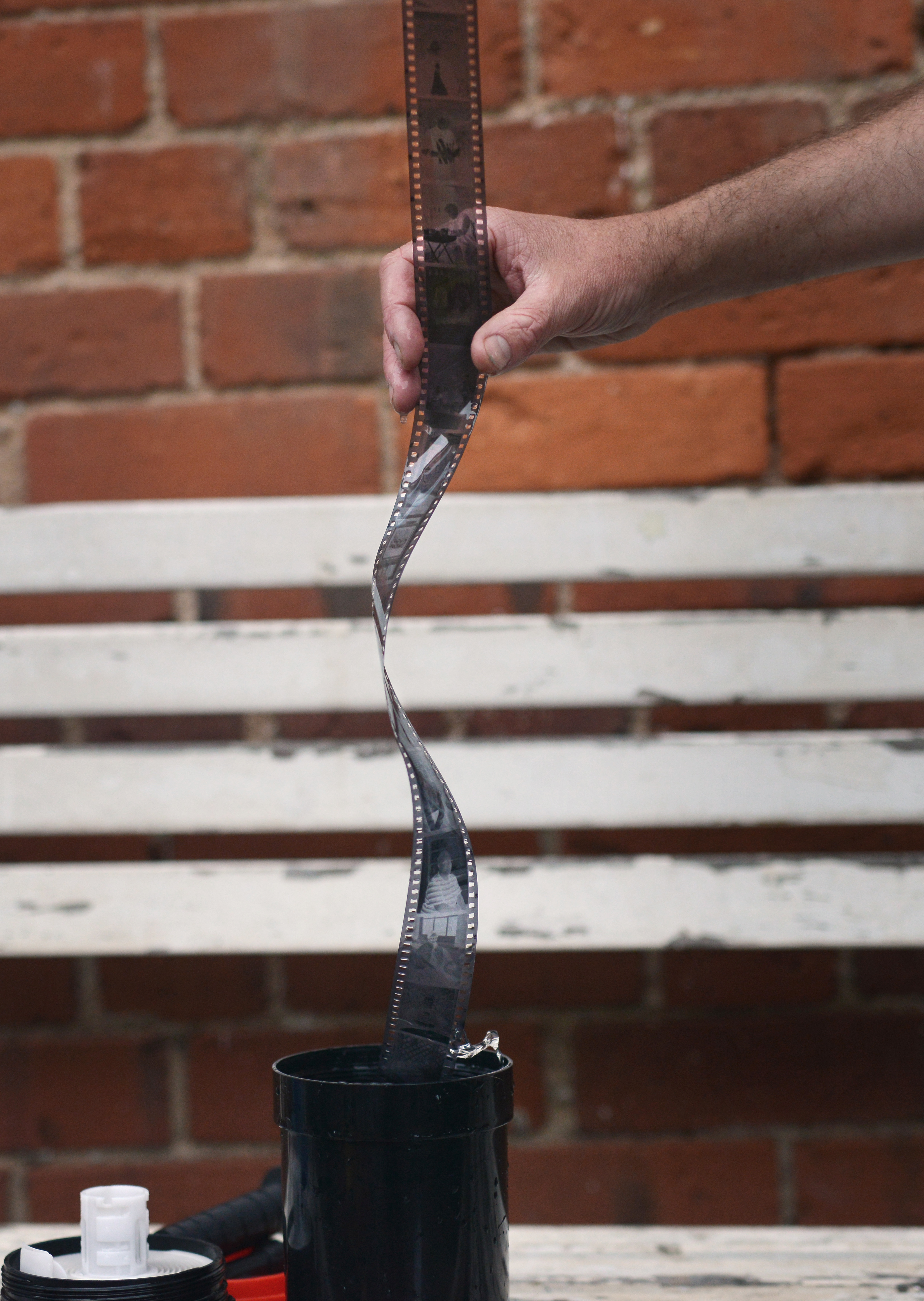 rinsing the film with water