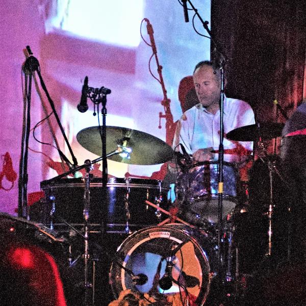 Peter Stapleton playing the drums