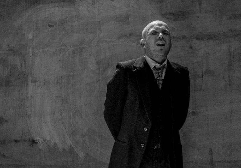 Jonny Marks singing in a Silo