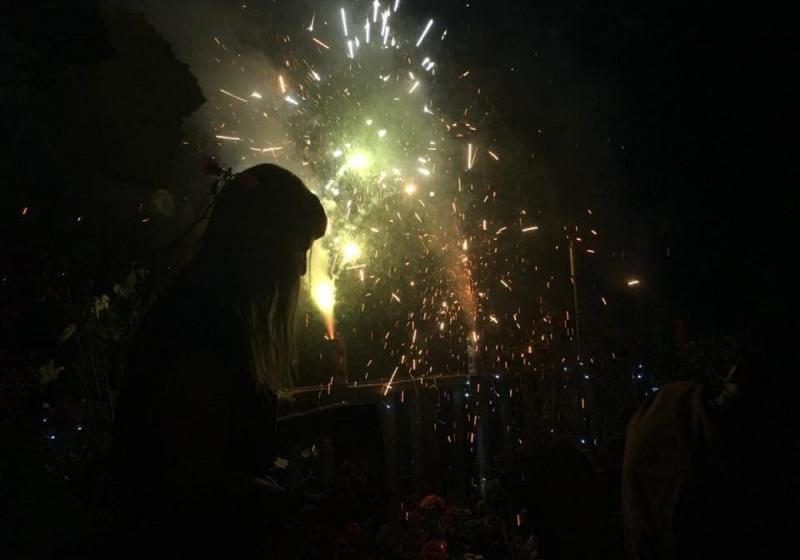 Birgit framed by fireworks