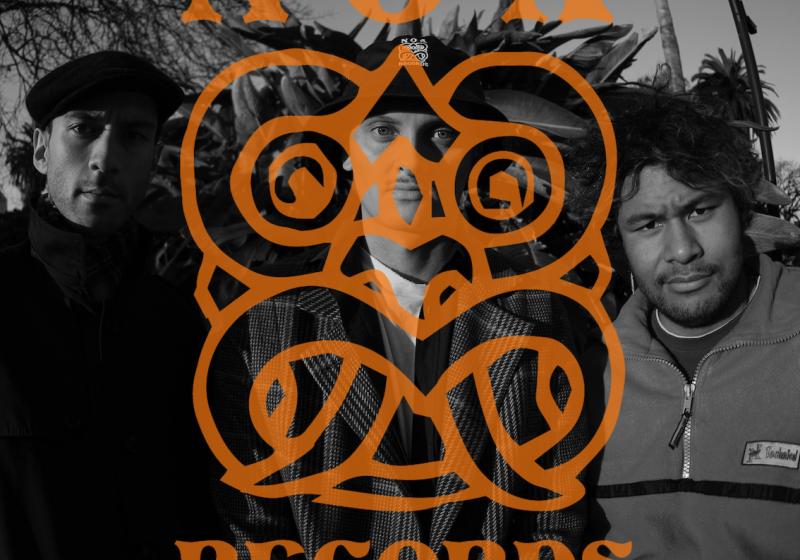 The label logo over an image of the members