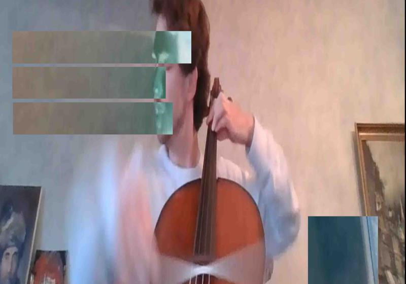 A pixelated photo of Nicholas Denton Protsack playing cello on Zoom