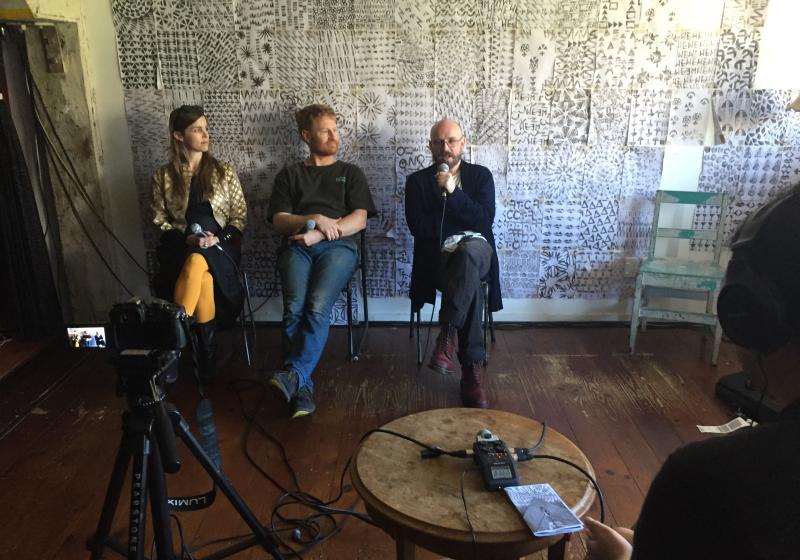 Nell, Dan, and Jonny being interviewed