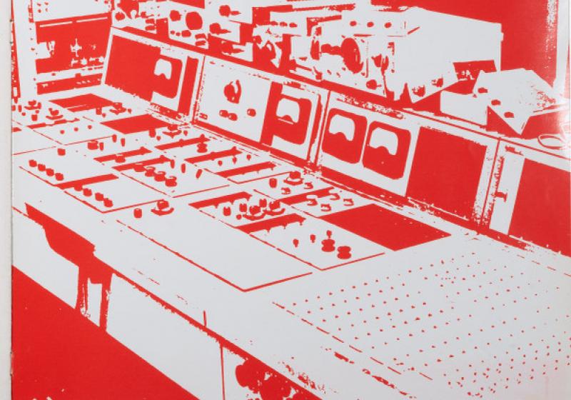 A studio mixing desk. The photo is high contrast and is red and white