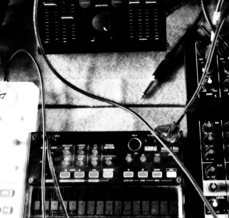 A black and white highly contrasted grungy photo of hardware