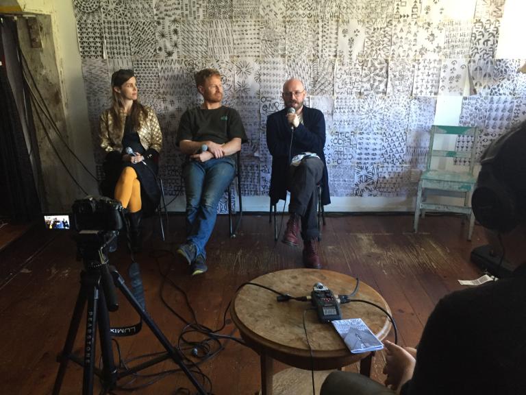 Nell, Dan, and Jonny being interviewed